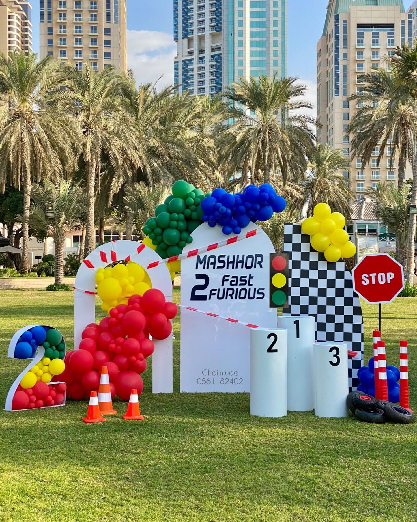 Outdoor racing birthday balloon decor with colorful balloons for kids party in Dubai.