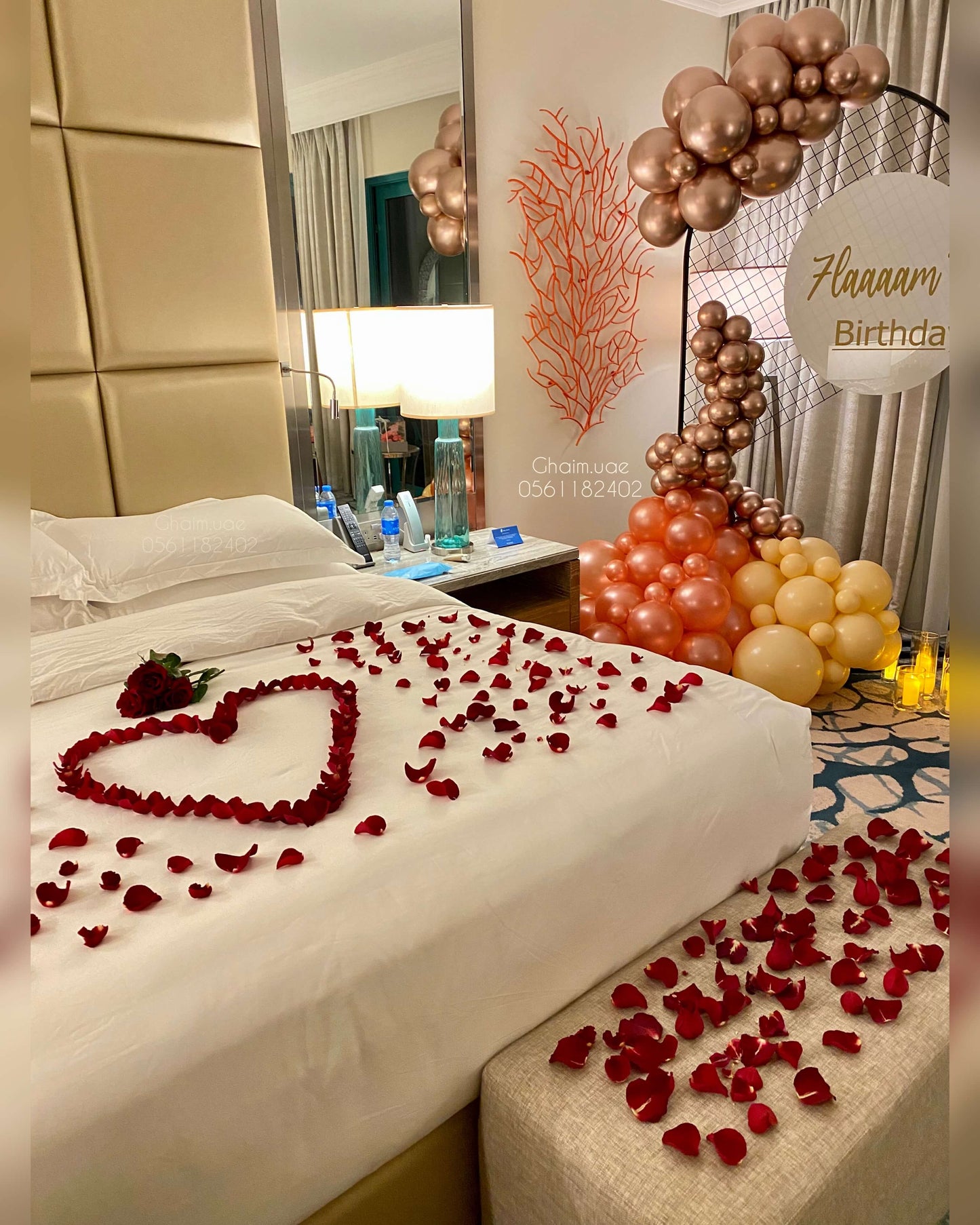 Rose gold balloon arch luxury birthday setup Dubai UAE